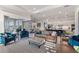 Spacious open floor plan living space with view of the kitchen, dining, and outdoor area at 6535 Shimmering Shores Ln, St Cloud, FL 34771