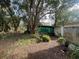 Backyard with storage shed and mature trees at 826 Rosalia Dr, Sanford, FL 32771