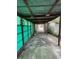 Covered carport with metal roof and concrete driveway at 826 Rosalia Dr, Sanford, FL 32771