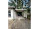 Carport with a covered driveway and a fenced side yard at 826 Rosalia Dr, Sanford, FL 32771