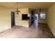 Open concept kitchen and dining area with a serving hatch and dated finishes at 826 Rosalia Dr, Sanford, FL 32771