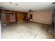 Spacious living area with wood paneling, fireplace, and ceiling fan at 826 Rosalia Dr, Sanford, FL 32771