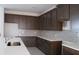 Kitchen with sleek countertops, ample cabinetry, and stylish backsplash at 14568 Crestavista Ave, Clermont, FL 34714