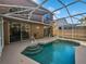 Inviting pool and patio area perfect for outdoor entertaining at 148 Harwood Cir, Kissimmee, FL 34744