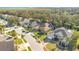 Aerial view of a home nestled in a residential neighborhood at 1942 Willow Wood Dr, Kissimmee, FL 34746