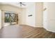Spacious living area with sliding glass doors leading to a patio at 1942 Willow Wood Dr, Kissimmee, FL 34746