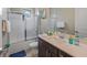 Clean and modern bathroom with shower/tub combo and single vanity at 244 Villa Domani Cir, Davenport, FL 33896