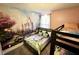 Princess themed bedroom with a castle mural and bunk beds at 244 Villa Domani Cir, Davenport, FL 33896