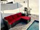 Relaxing patio area with comfortable seating, a grill, and a sparkling pool at 244 Villa Domani Cir, Davenport, FL 33896