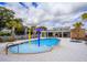 Community splash pad area with water features and a pool at 244 Villa Domani Cir, Davenport, FL 33896