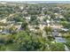 An aerial perspective of a residential neighborhood with houses, streets, and trees at 3109 Williams St, Orlando, FL 32806