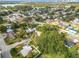 An aerial view of a residential neighborhood with houses, streets, and trees at 3109 Williams St, Orlando, FL 32806
