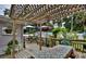 Relaxing backyard deck perfect for outdoor dining and entertaining, featuring a pergola at 431 Perdita Ave, Edgewater, FL 32132