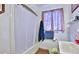 Clean bathroom with shower/tub combo and window at 431 Perdita Ave, Edgewater, FL 32132