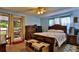 Spacious bedroom with king-size bed and access to patio at 431 Perdita Ave, Edgewater, FL 32132