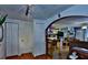 Home hallway with built-in storage and view of kitchen at 431 Perdita Ave, Edgewater, FL 32132