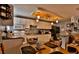Kitchen with white cabinets, dining table, and ample counter space at 431 Perdita Ave, Edgewater, FL 32132