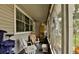 Relaxing screened porch with rocking chairs and storage cabinet at 431 Perdita Ave, Edgewater, FL 32132