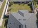 Aerial view of the home's roof and fenced backyard at 4902 Soft Rush St, Orlando, FL 32811