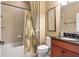 Bathroom with shower/tub combo and updated vanity at 513 San Sebastian Ct, Davenport, FL 33837