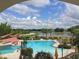 Resort-style pool with lake view, offering a relaxing outdoor space at 513 San Sebastian Ct, Davenport, FL 33837