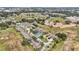 Aerial view showing home, pool, and community at 707 Carpenters Way # 45, Lakeland, FL 33809