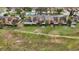 Aerial view of townhome community and green space at 707 Carpenters Way # 45, Lakeland, FL 33809