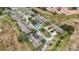 Aerial view of townhome community with pool at 707 Carpenters Way # 45, Lakeland, FL 33809