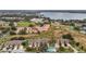 Aerial view of townhome community near lake at 707 Carpenters Way # 45, Lakeland, FL 33809