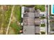 Top-down view of townhome roofs and parking at 707 Carpenters Way # 45, Lakeland, FL 33809