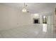 Living room with fireplace and access to patio at 707 Carpenters Way # 45, Lakeland, FL 33809