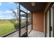 Spacious screened porch overlooking a peaceful backyard at 707 Carpenters Way # 45, Lakeland, FL 33809