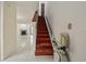 Staircase with chair lift at 707 Carpenters Way # 45, Lakeland, FL 33809