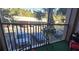 Balcony with artificial turf, patio furniture, and a view of the parking lot at 8252 Civita Dr # 201, Davenport, FL 33896