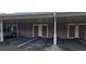 Covered parking area with multiple designated spots at 8252 Civita Dr # 201, Davenport, FL 33896
