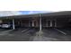 Covered parking area with designated spots and additional parking available at 8252 Civita Dr # 201, Davenport, FL 33896