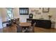 Community coffee bar with seating area and coffee machine at 8252 Civita Dr # 201, Davenport, FL 33896