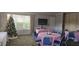Meeting room or event space set up with round tables and chairs at 8252 Civita Dr # 201, Davenport, FL 33896