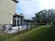 Private backyard with a screened porch, in-ground pool, and lush lawn at 915 Ekana Green Ct, Oviedo, FL 32765