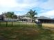 Fenced backyard featuring a pool, patio, and lush lawn at 915 Ekana Green Ct, Oviedo, FL 32765