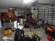Two-car garage with storage space and various equipment at 915 Ekana Green Ct, Oviedo, FL 32765