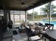 Relaxing screened lanai with view of the pool and golf course at 915 Ekana Green Ct, Oviedo, FL 32765