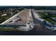 Aerial view of construction site with machinery and partially completed roads at 977 Hawksnest Pt, Oviedo, FL 32765