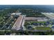 Aerial view of a residential development with ongoing construction and completed homes at 977 Hawksnest Pt, Oviedo, FL 32765