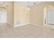 Dining area with tile flooring, chandelier, and view of front door at 10421 Andover Point Cir, Orlando, FL 32825