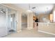 Open kitchen and dining area with access to a patio at 10421 Andover Point Cir, Orlando, FL 32825