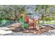 Community playground with slides, climbing structures, and shaded areas at 11840 Eagle Ray Lane, Orlando, FL 32827