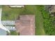 Aerial view of house, driveway, and surrounding landscape at 2807 Plymouth Pl, Kissimmee, FL 34741