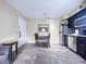 Open-concept kitchen and dining area with modern appliances at 3100 Parkway Blvd # 110, Kissimmee, FL 34747