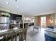 Open floorplan showcasing combined living, dining, and kitchen areas at 3100 Parkway Blvd # 110, Kissimmee, FL 34747